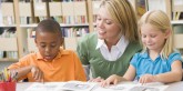 Kids reading with Teacher